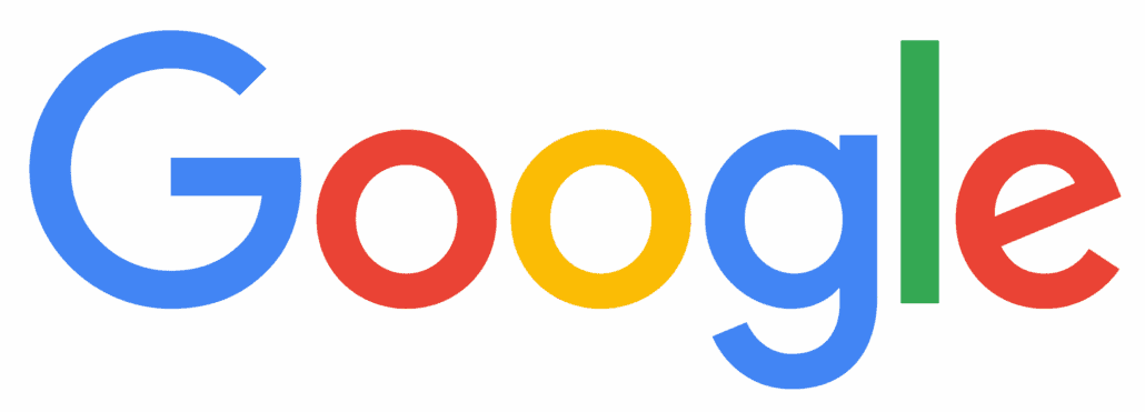 Hochwertiges Businessfoto eines Mannes im Anzug vor moderner Bürolandschaft.